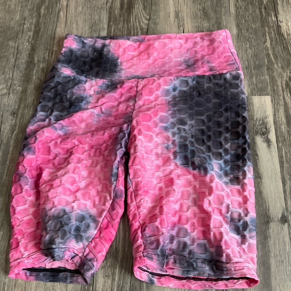 Black and pink, scrunched in the butt area,